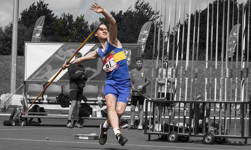 Athlete throws javelin