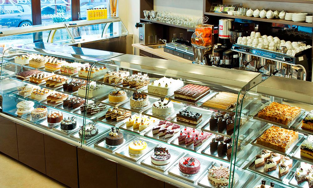 Confectionery counter full of cakes