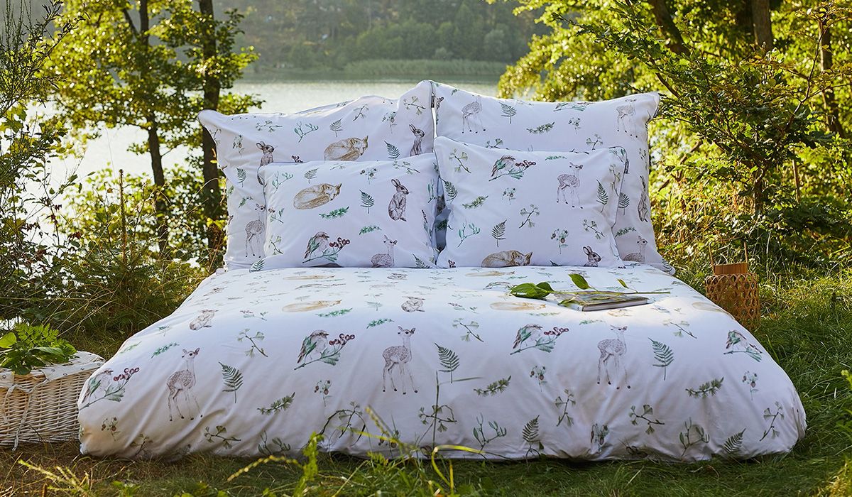 Cotton bedding with a forest theme