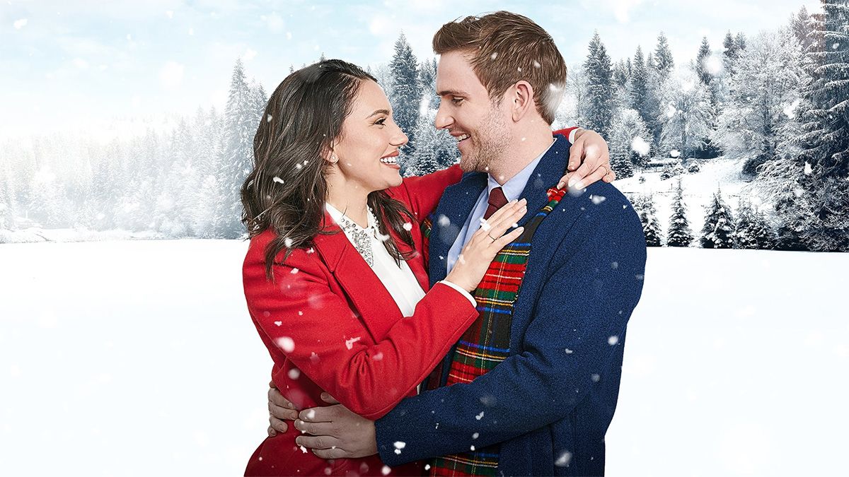 Couple embraces against the background of snow