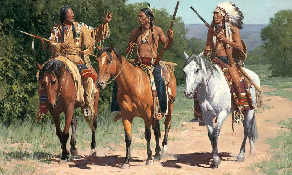 Three native indians on horses